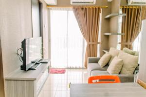 Nice and Elegant 2BR at Serpong Greenview Apartment By Travelio