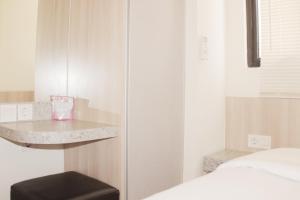 Serene and Cozy 2BR at Meikarta Apartment By Travelio