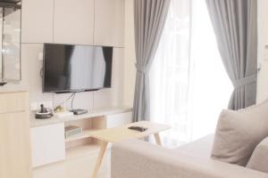 Serene and Cozy 2BR at Meikarta Apartment By Travelio