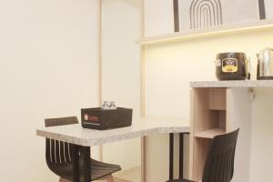 Serene and Cozy 2BR at Meikarta Apartment By Travelio