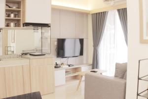 Serene and Cozy 2BR at Meikarta Apartment By Travelio