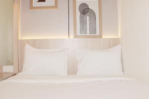 Serene and Cozy 2BR at Meikarta Apartment By Travelio