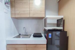 Best Deal and Comfortable 1BR The Alton Apartment By Travelio