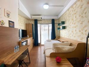 Bohemian Beauty Studio Room at Grand Asia Afrika Apartment By Travelio