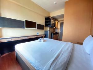 Cozy Studio Room at Suites @Metro By Travelio