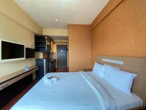 Cozy Studio Room at Suites @Metro By Travelio