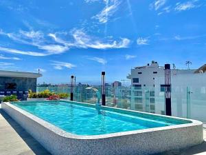 Rooftop, pool y amenidades