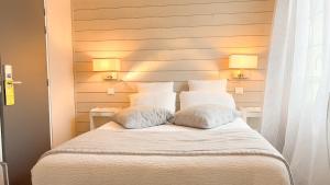 Hotels Logis hotel Restaurant Le Faisan Dore : photos des chambres