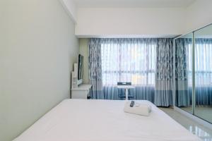 Nice and Comfy Studio at Springlake Summarecon Apartment By Travelio