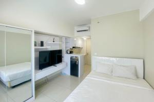 Nice and Comfy Studio at Springlake Summarecon Apartment By Travelio