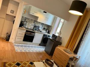 Appartements Appartement de 27 m2 agreable et lumineux idealement situe au coeur de la ville de Pierrefitte-sur-Seine : photos des chambres