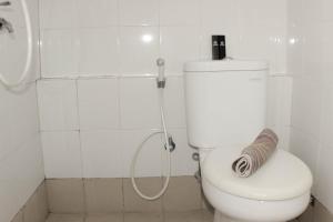 Minimalist and Homey 1BR at Bassura City Apartment By Travelio