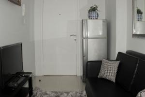 Minimalist and Homey 1BR at Bassura City Apartment By Travelio