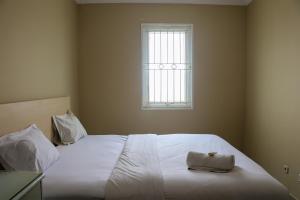 Comfort Living 3BR at Grand Palace Kemayoran Apartment By Travelio