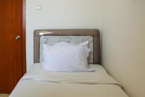 Comfort Living 3BR at Grand Palace Kemayoran Apartment By Travelio