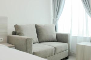 Elegant and Comfy Studio at Grand Kamala Lagoon Apartment By Travelio