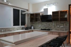 The BAEL - A Dreamscape 8 Room Luxury Farmstay GGN