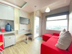 Cozy Furnished 2BR Apartment at Grand Asia Afrika By Travelio