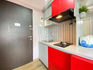 Cozy Furnished 2BR Apartment at Grand Asia Afrika By Travelio
