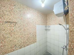 Cozy Furnished 2BR Apartment at Grand Asia Afrika By Travelio