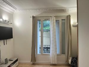 Appartements Charmant F2 de 35 m2 idealement situe a Epinay-sur-Seine : photos des chambres