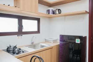 Comfort 2BR at Asatti Apartment By Travelio