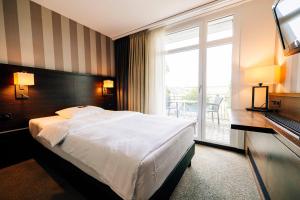 Classic Single Room with Balcony room in Park Hotel Winterthur