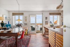 Lovely And Spacious Two-Level Apartment With Balcony, Elevator And Private Parking Just Steps From Ebeltofts Charming Pedestrian Streets, Cafés,