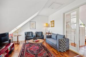 Lovely And Spacious Two-Level Apartment With Balcony, Elevator And Private Parking Just Steps From Ebeltofts Charming Pedestrian Streets, Cafés,