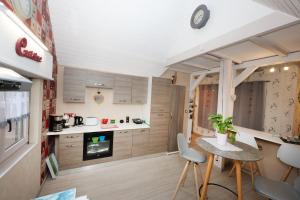 Appartements Le clocher aux cigognes au village de Bergheim : photos des chambres