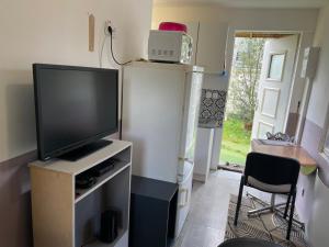 Petite maison cosy au fond du jardin