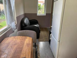 Appartements Petite maison cosy au fond du jardin : photos des chambres