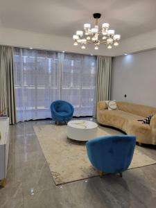 The executive royal beautifully furnished two bedroom apartment with amazing scenic city views heated swimming pool and fully equipped gym and child play area