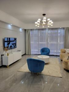 The executive royal beautifully furnished two bedroom apartment with amazing scenic city views heated swimming pool and fully equipped gym and child play area