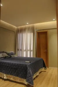 Apartamento 3/4 decorado em condomínio frente mar - 拜肖
