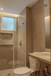 Apartamento 34 decorado em condomínio frente mar