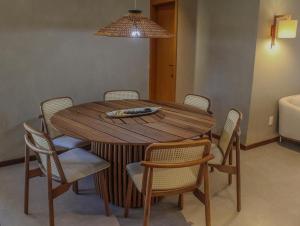 Apartamento 34 decorado em condomínio frente mar