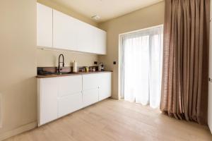 Appartements Standing 4 chambres et 4 salles de bains face marche de Wazemmes Lille : photos des chambres