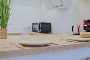 Appartements La confidence : photos des chambres