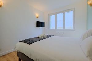 Appartements La confidence : photos des chambres