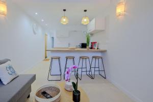 Appartements La confidence : photos des chambres