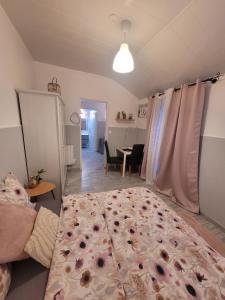 Appartements Petite Maison avec son jardin et acces independant a 14 mn de paris : photos des chambres