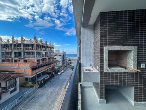 133 - Lindo apartamento na praia de Bombas