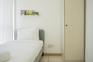 Comfort 2BR Apartment at M-Town Residence By Travelio