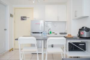 Comfort 2BR Apartment at M-Town Residence By Travelio