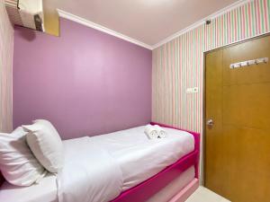 Cozy Living 2BR Apartment at Gateway Ahmad Yani Cicadas By Travelio