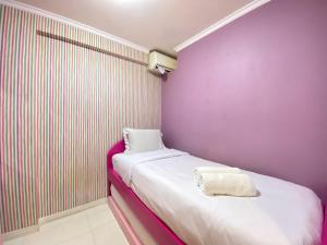 Cozy Living 2BR Apartment at Gateway Ahmad Yani Cicadas By Travelio