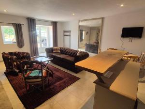Appartements Gite equestre, belle maison ancienne en pierre : photos des chambres