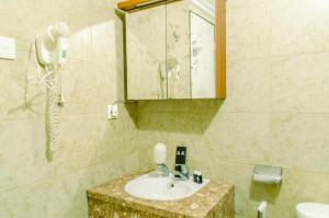 Simply and Cozy Pool View 2BR at Great Western Apartment By Travelio