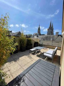Appartements Duplex avec terrasse face a la cathedrale : photos des chambres